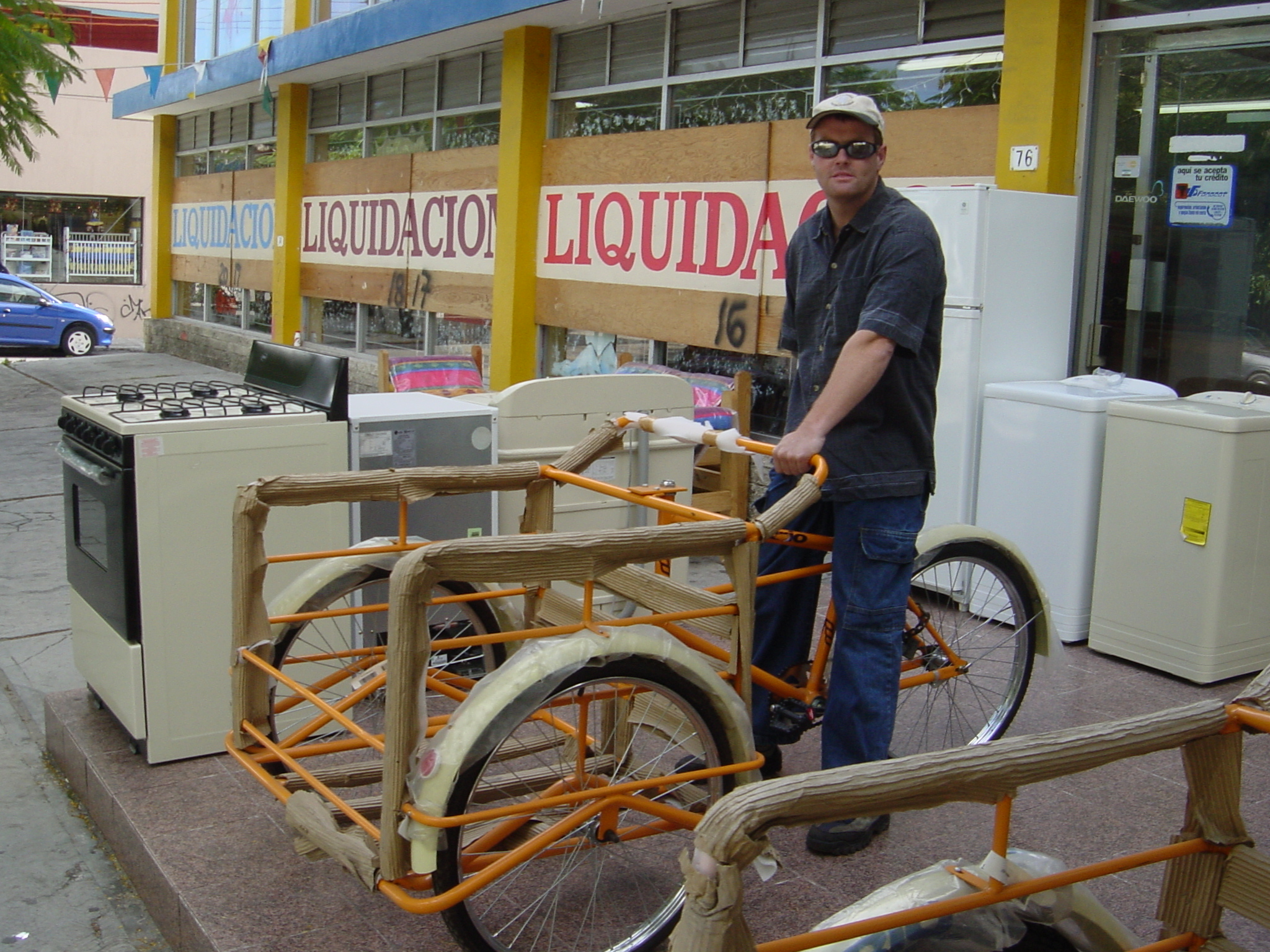 We managed to trade Jamie’s bike in for the new 3 wheel model - It will be great when you go to the shops, Jamie, honest. Previous Photo Back to week 10 Next Photo