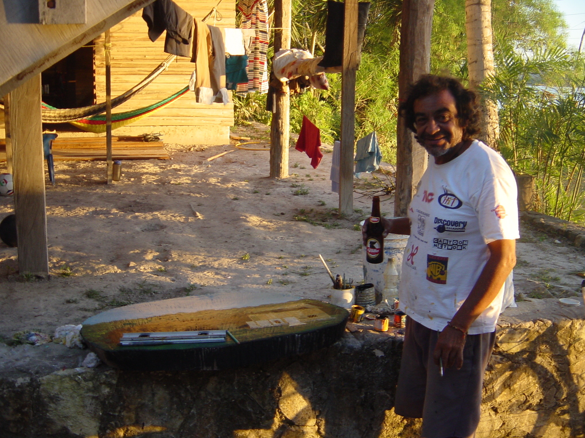This bloke was painting the sign for the hotel/shack we were staying at. More a drunk than artist
