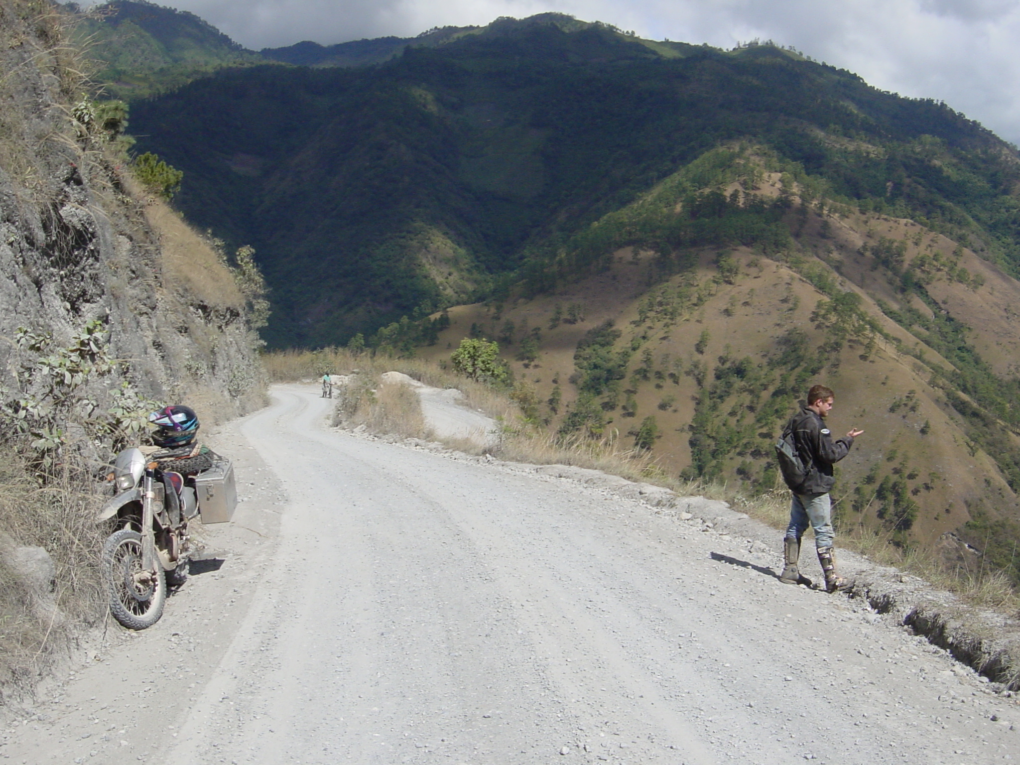 We are taking a break and admiring the view after some hard riding only to look down the road and see a guy pushing a bike up the hill we just road up