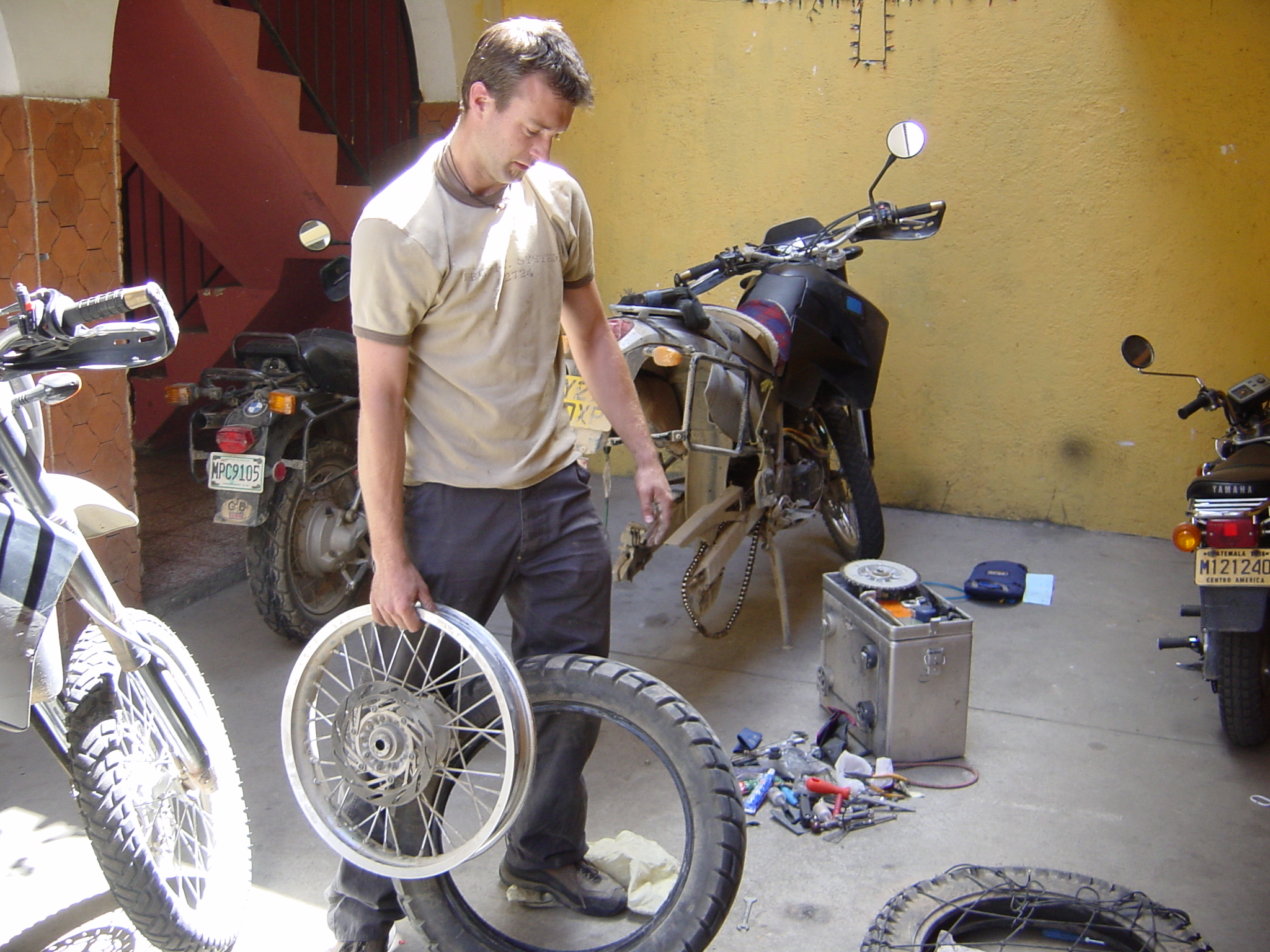 Again, a hotel courtyard provided us with our own private workshop to change our punished rear tyres.