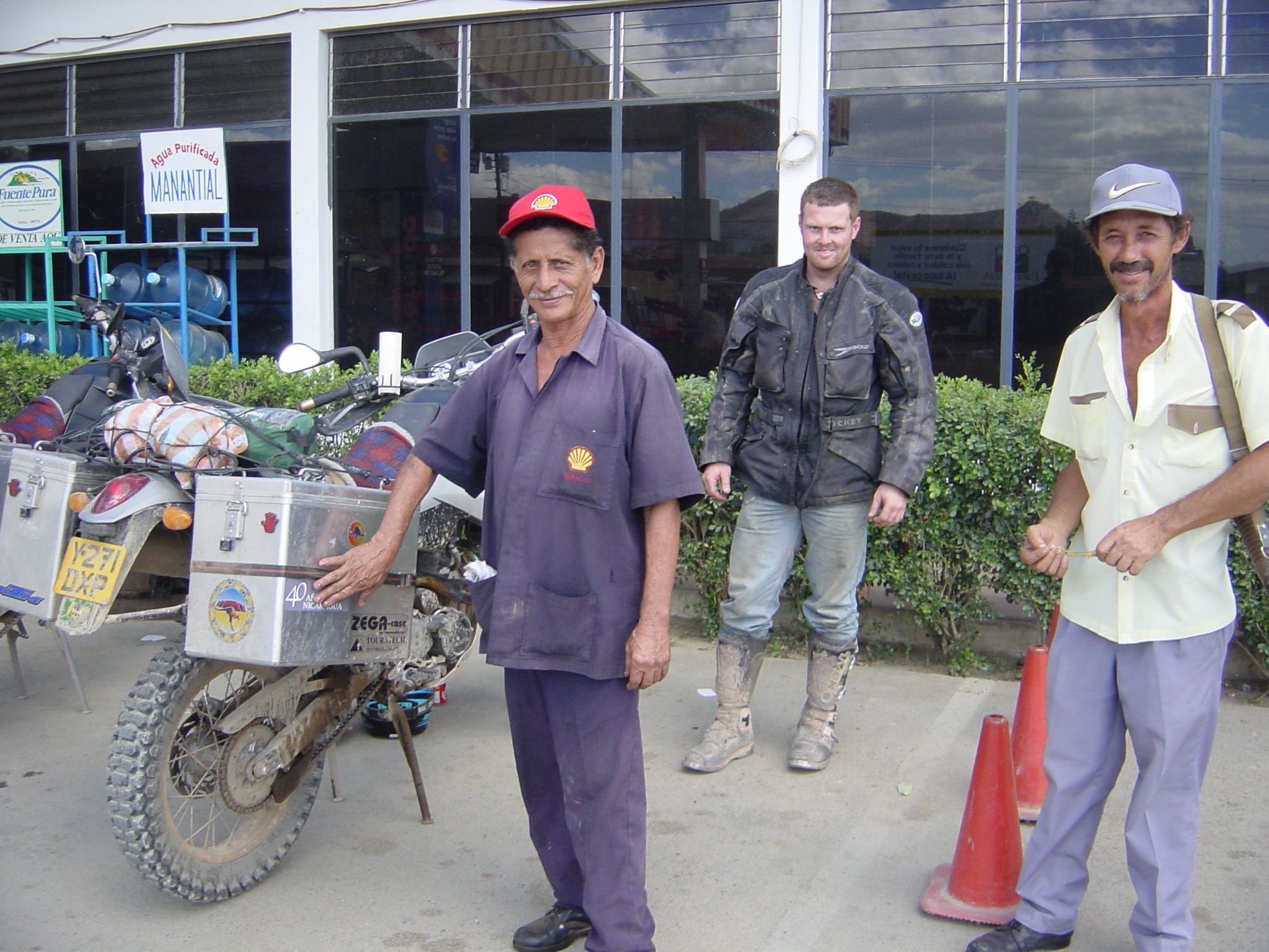 The service station attendants decided that a couple more stickers were required on our bikes; how could we argue? The one on the right had a shotgun.