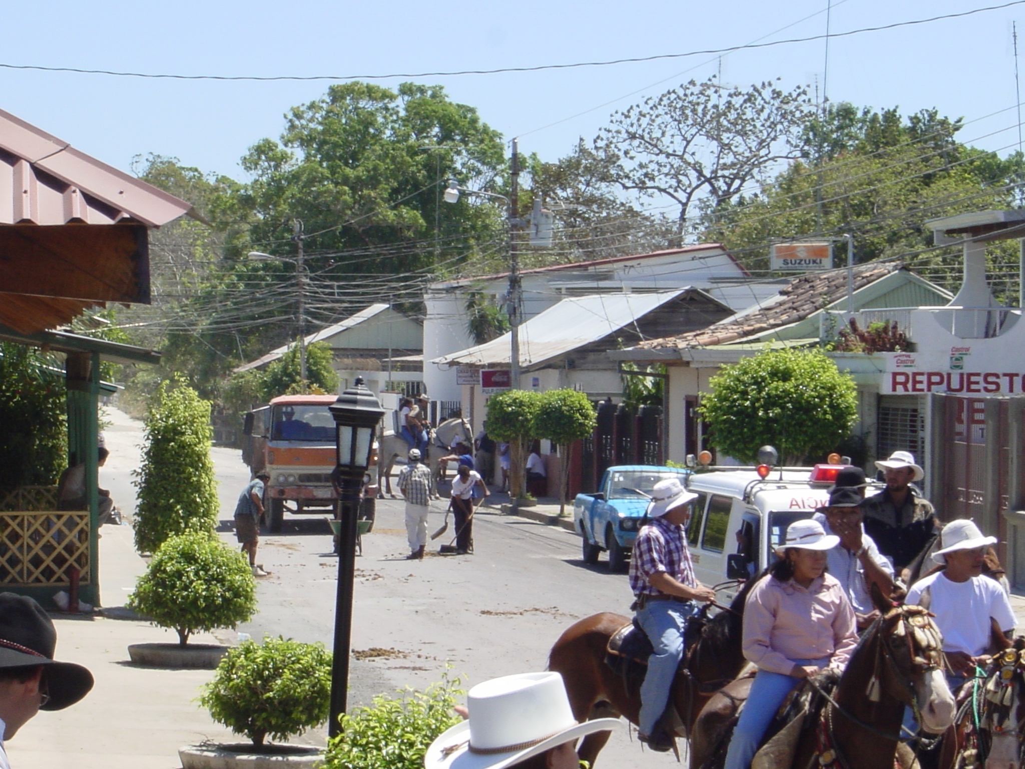After half a dozen bulls and several hundred horses passed by the street, the obvious cleanup had to occur.