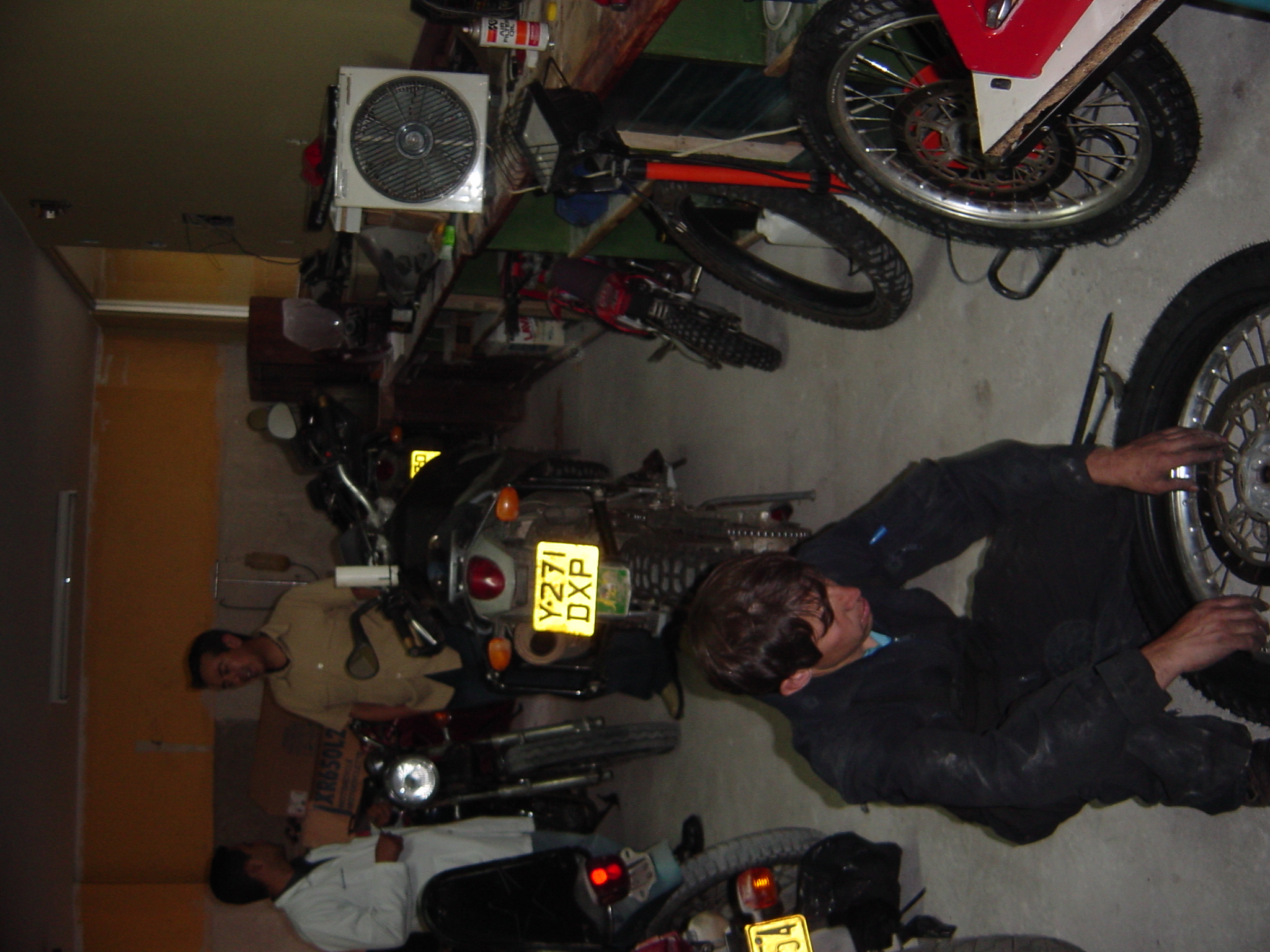 Mechanic at the Motociclismo in Quito. We were asking questions about bikes and altitude, and were informed that the bikes had a device to automatically adjust the mixture for altitude.