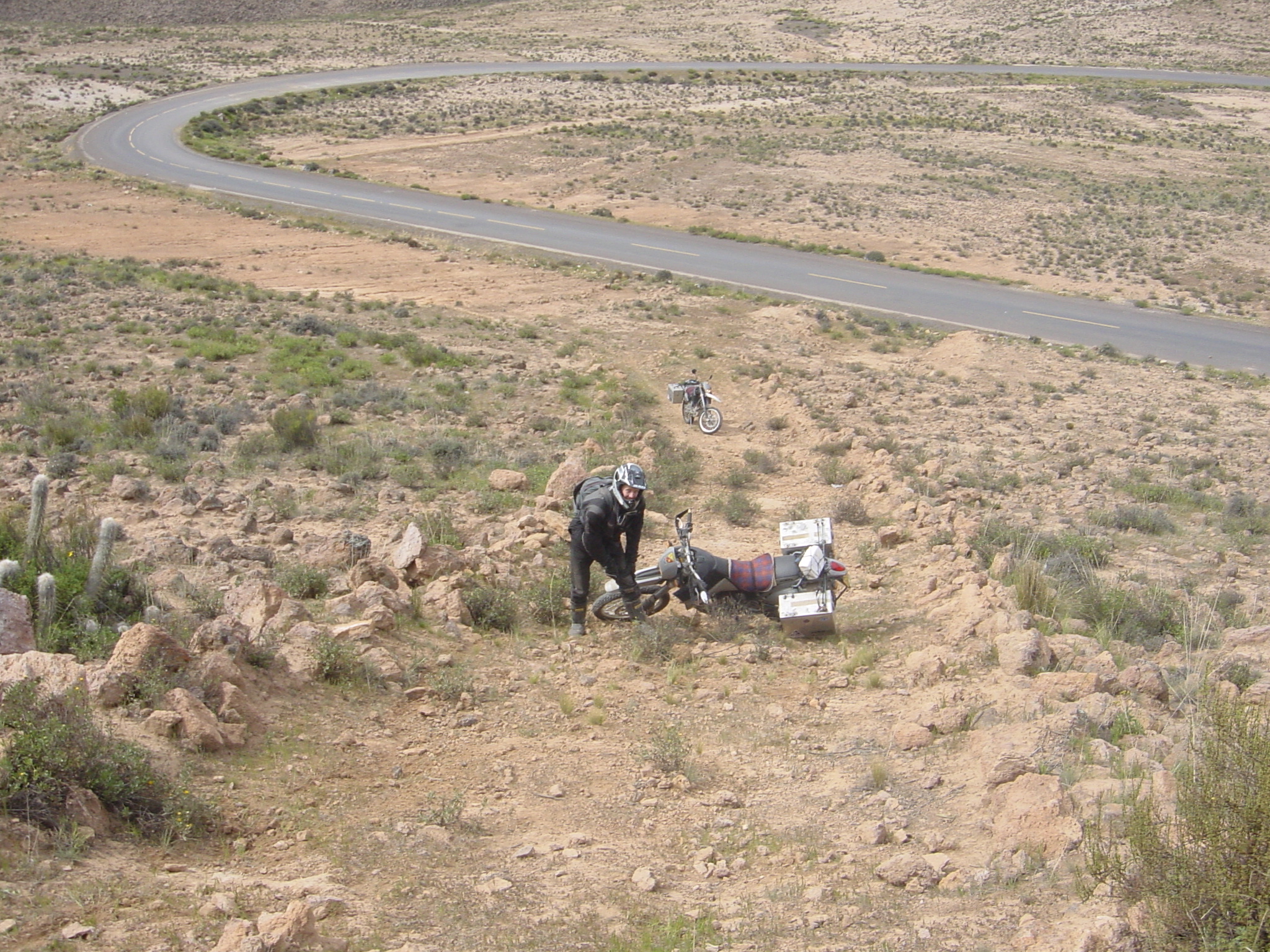 Hey, doesn't that sealed road lead to the top of this hill? Short cuts sometimes don't go as they are meant to.