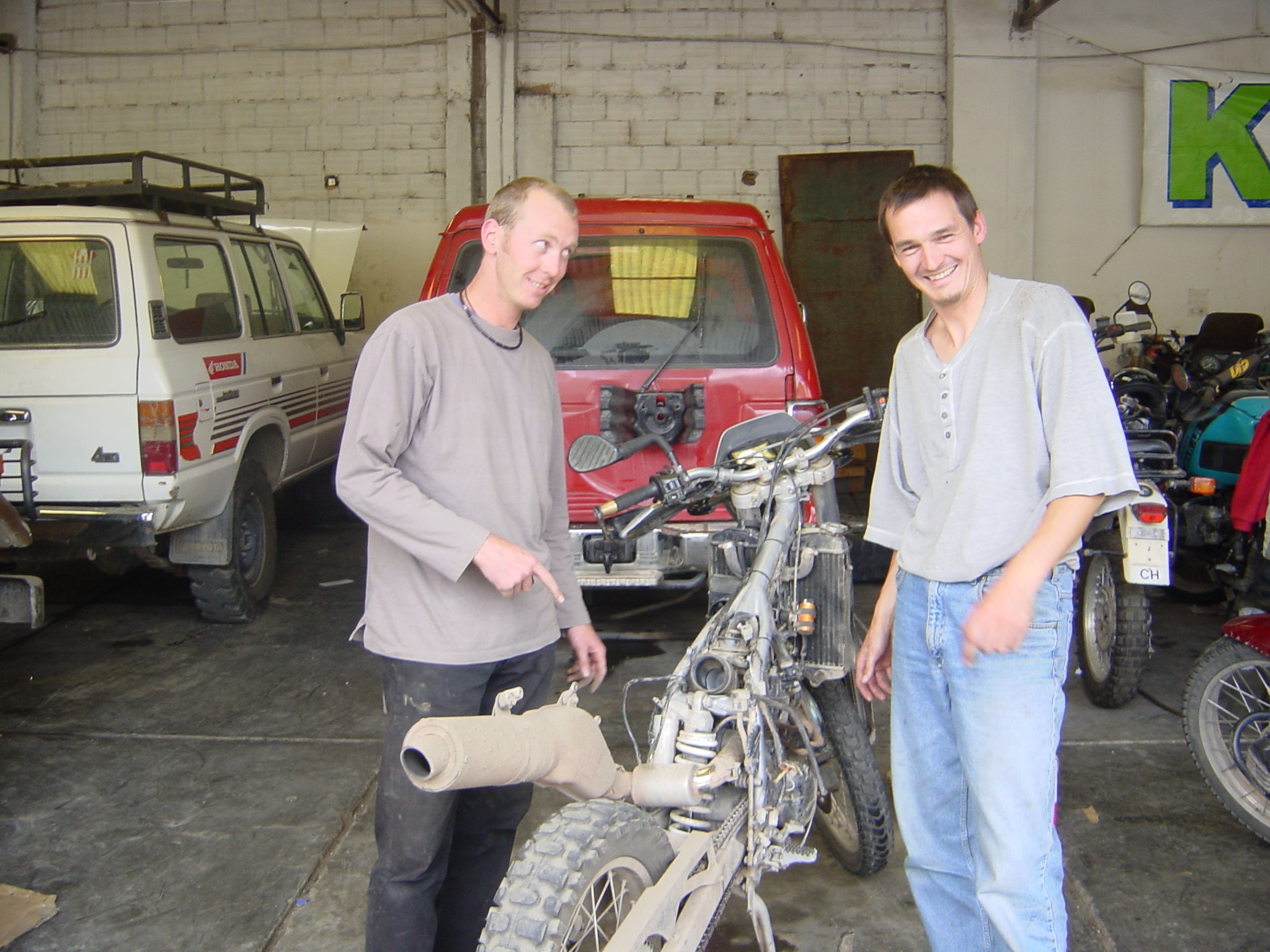Alex, a German rider, was quite amused by Jamie's very naked bike.