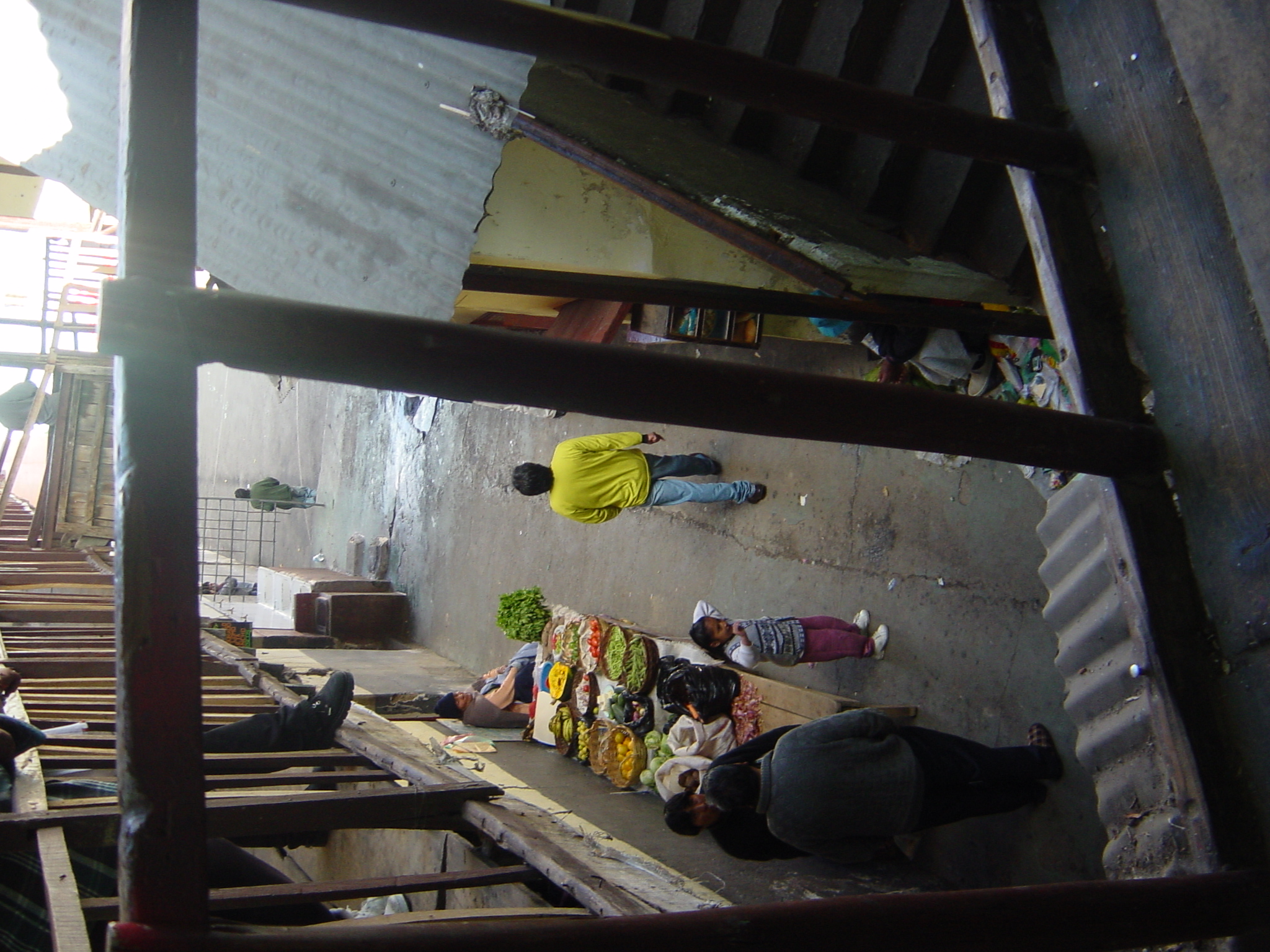 This is in the prison. A food market and children!