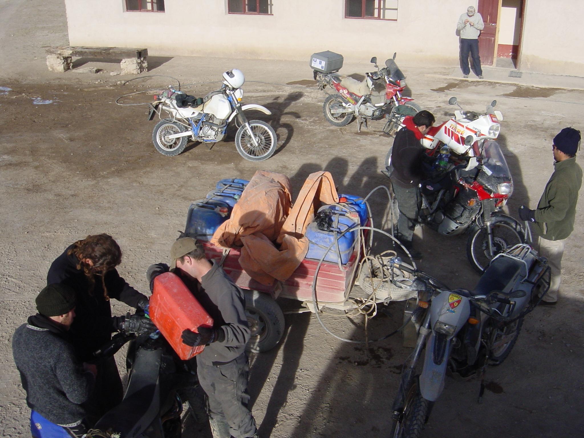 fueling up the next morning - boy, it is cold. sub zero and bikes hard to start