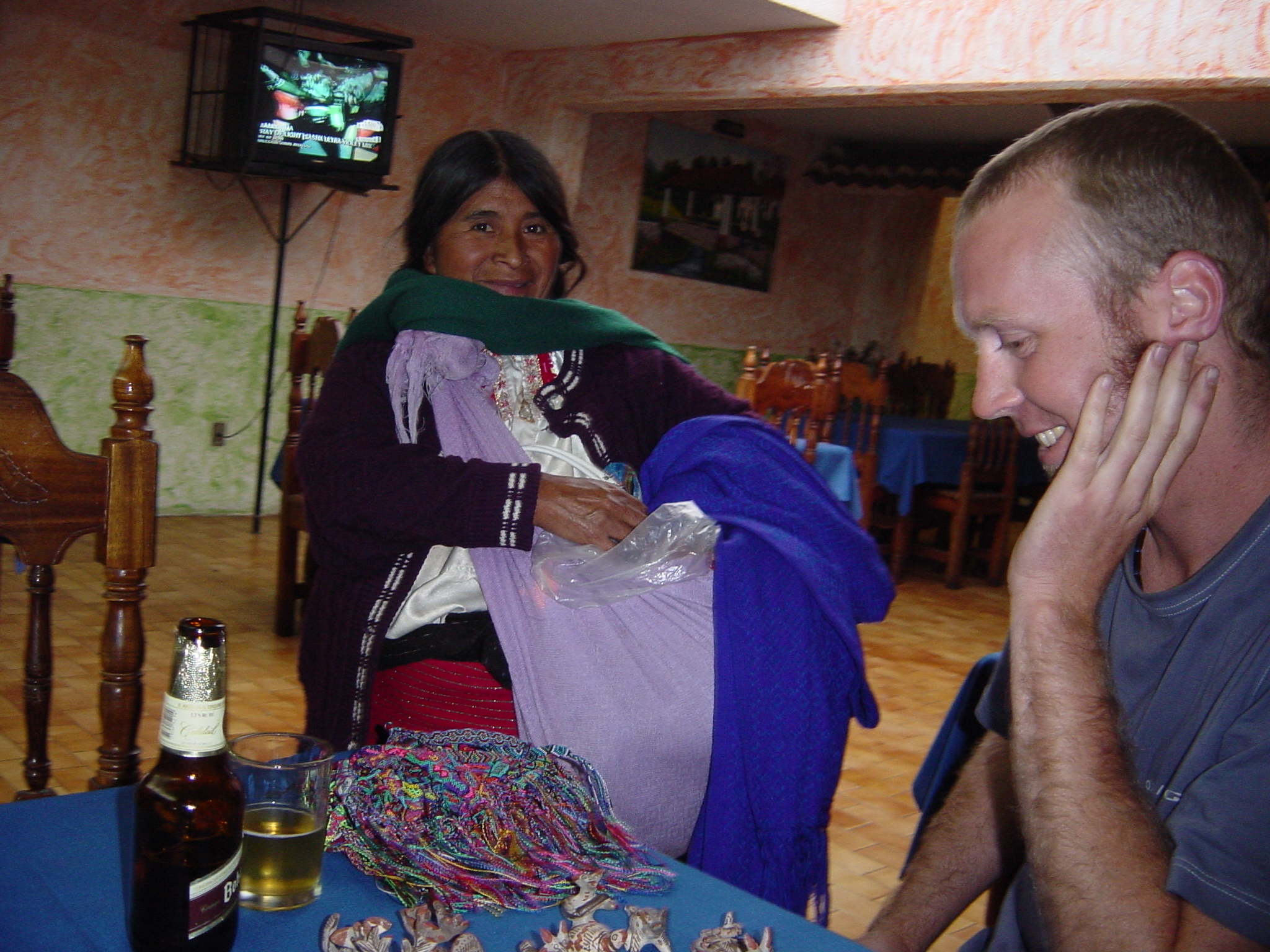 Go on, buy something - Persistent lady in San Cristobal restaurant